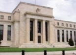البنك المركزي الامريكي يخفض مشتريات السندات.. ويؤكد على سياسة نقدية تيسيرية